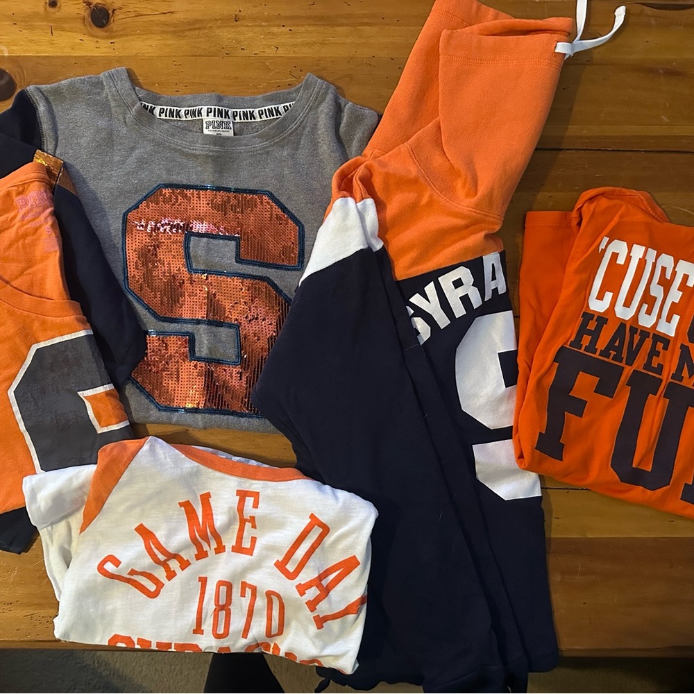 multiple women’s Syracuse tops